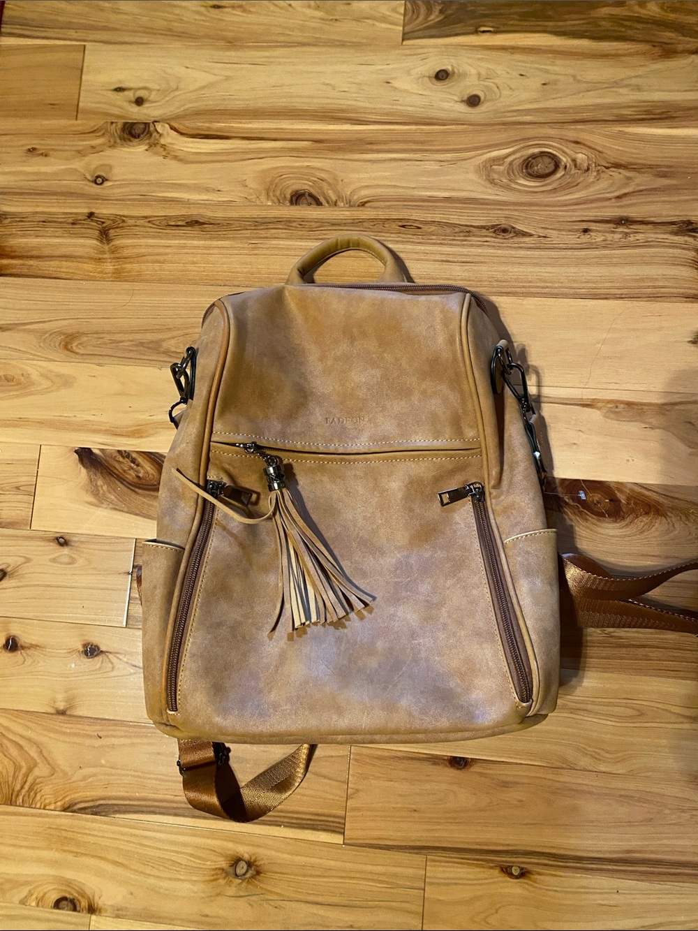 Tan Faux Leather Backpack with Tassel Accent